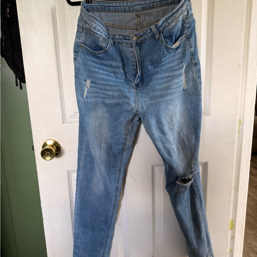 Distressed Light Blue Jeans